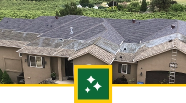 A large beige house with a complex roof, partially covered in moss and mildew, showcases a striking contrast between clean and dirty areas. In the foreground, a green square with white sparkle icons promotes Sunny Side Roof Rejuvenate Roofing in Florida.